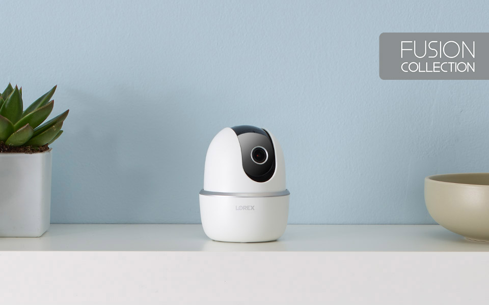 2K pan-tilt indoor wifi smart home camera on table